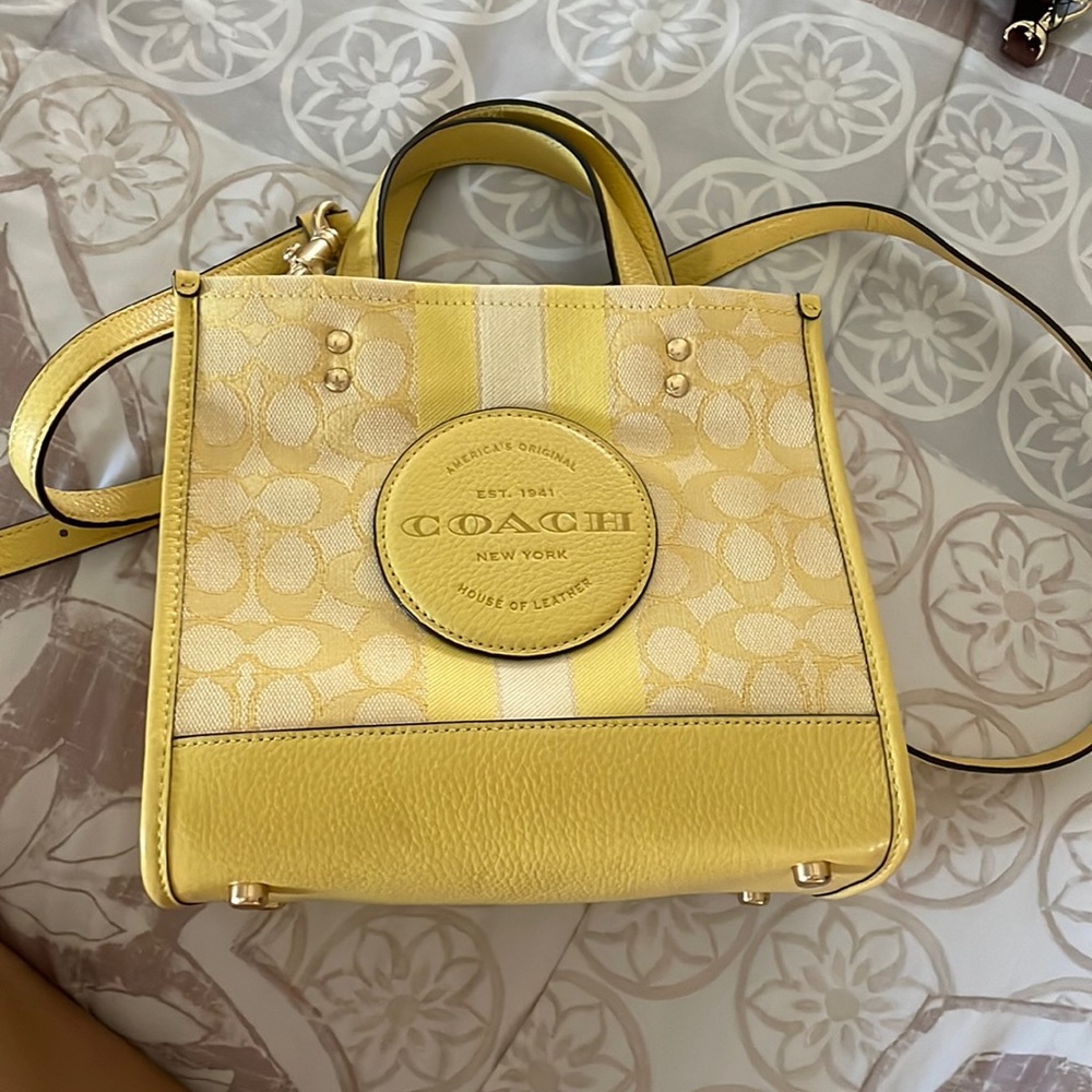 yelllow coach bag